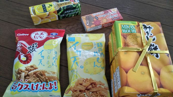Mikan mochi, lemon-flavored fried squid snacks, lemon-flavored Kappa Ebisen, momiji manju caramel, and Hiroshima lemon Lemosco