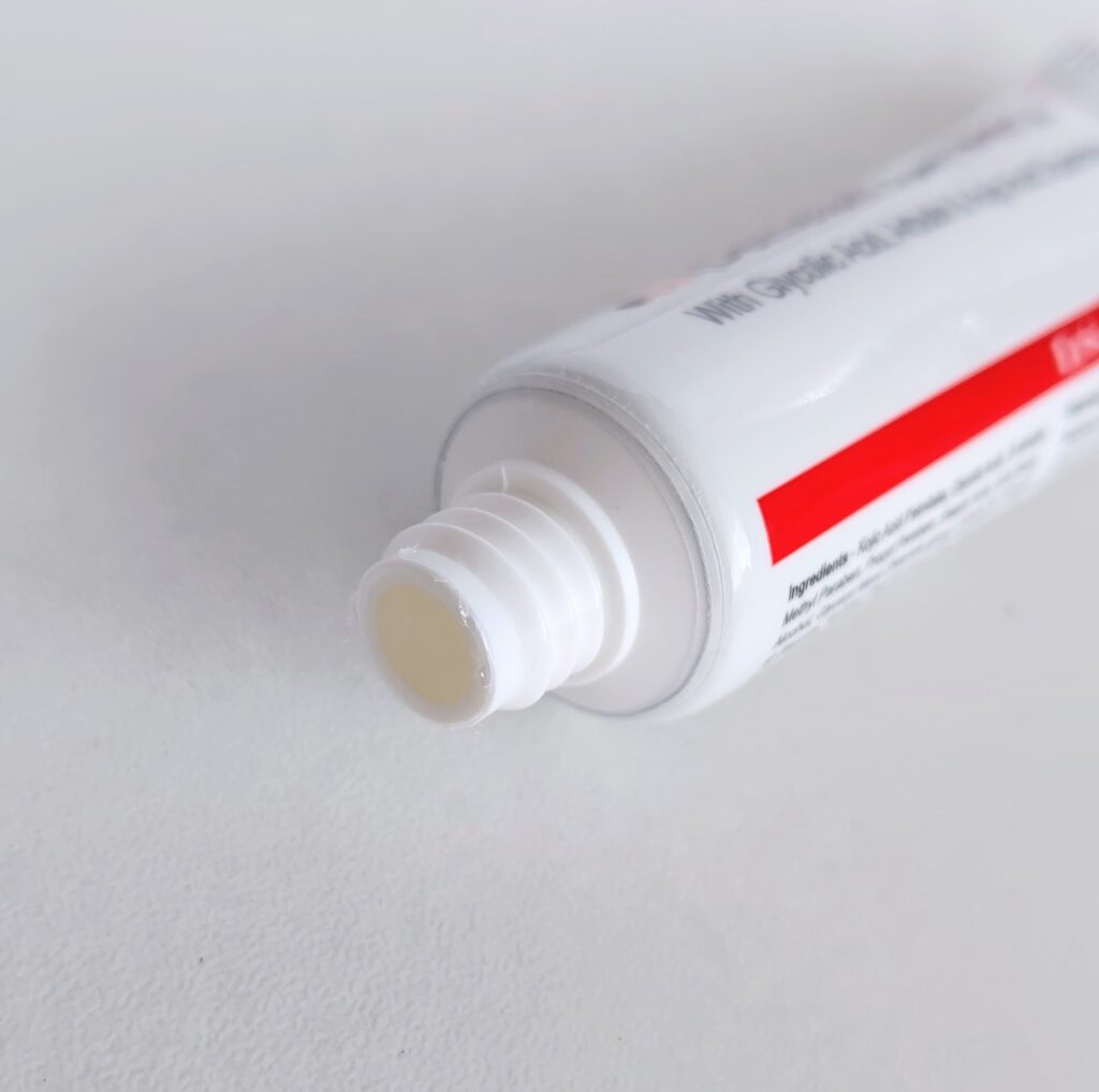 Demelan Cream sealed tube opening